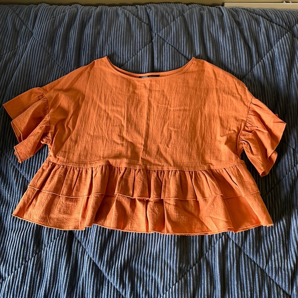 Burnt peplum top